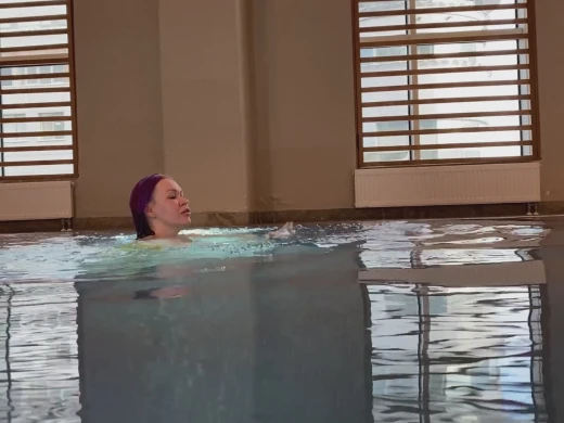 Purple haired chick drops down on her knees to suck a dick