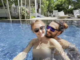 Amateur couple has some fun in neighbor's big swimming pool