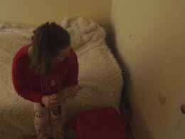 Brunette girl with saggy tits fingering her snack on camera