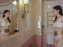 Young tattooed girl masturbating in the bathroom