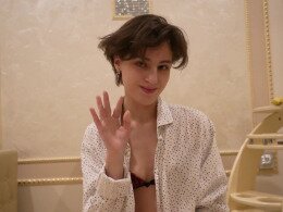 Skinny brunette masturbating with banana
