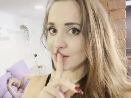 Solo chick moans while masturbating with a pink vibrator
