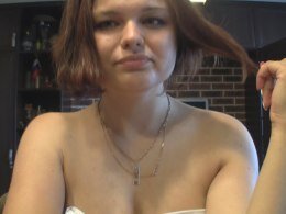 Brunette acts kinkily on camera to excite all of her viewers